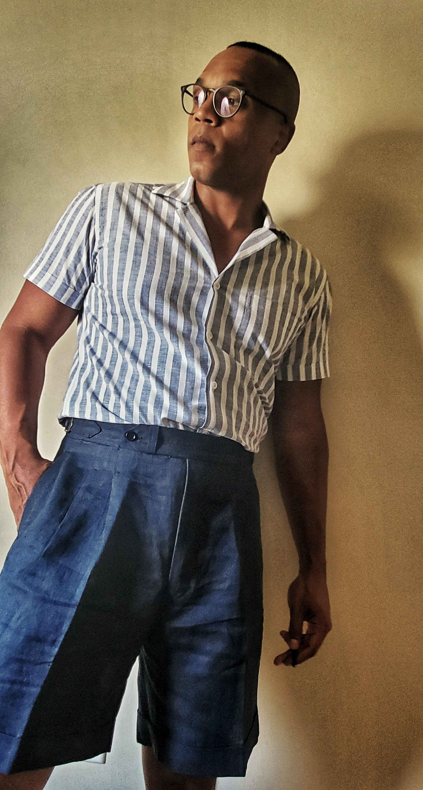 Man Wearing Blue Striped Capri Collar Shirt