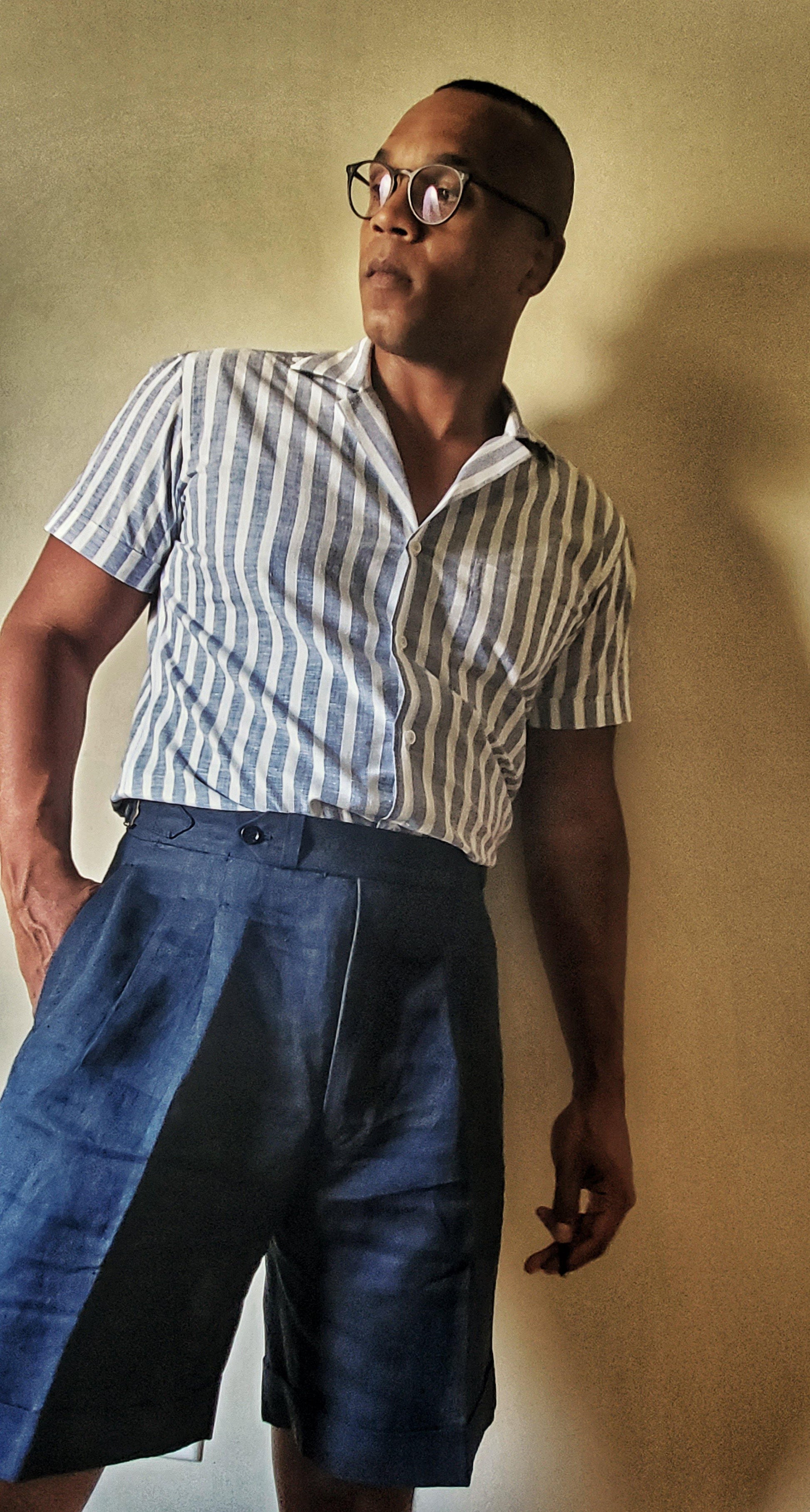 Man Wearing Blue Striped Capri Collar Shirt
