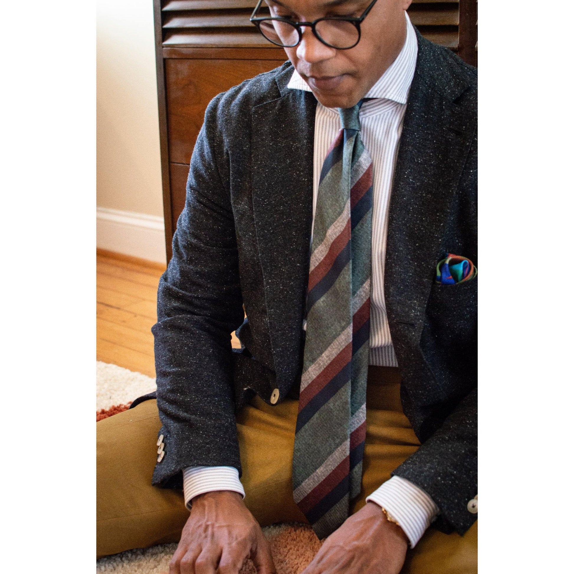 Man Wearing Striped Green Silk Tie - X Of Pentacles