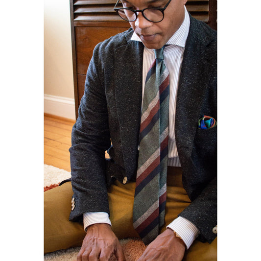 Man Wearing Striped Green Silk Tie - X Of Pentacles